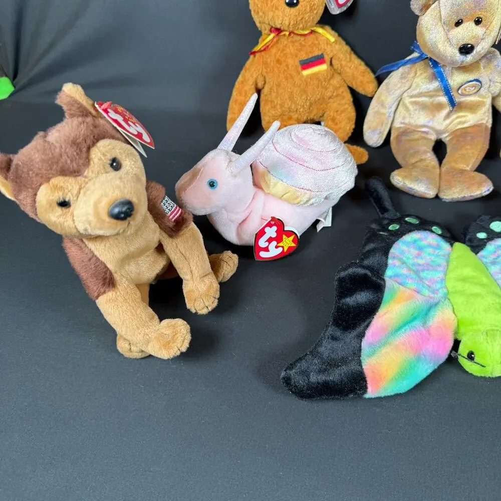 Lot of 8 Ty Beanie Babies Bears Fish Butterfly Dog Plush With Tags Retired